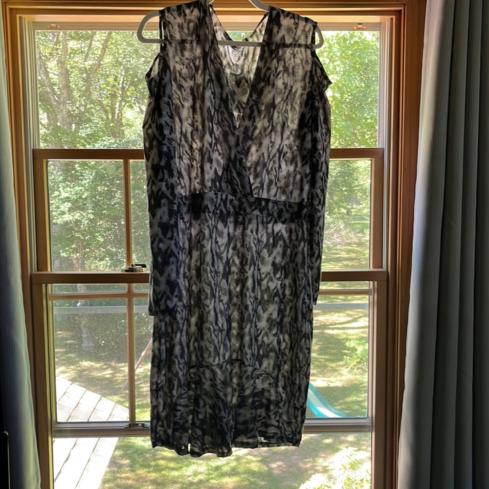 Rebdolls size 2X. Snake print long sleeve. Shoulder cut outs. NWT.